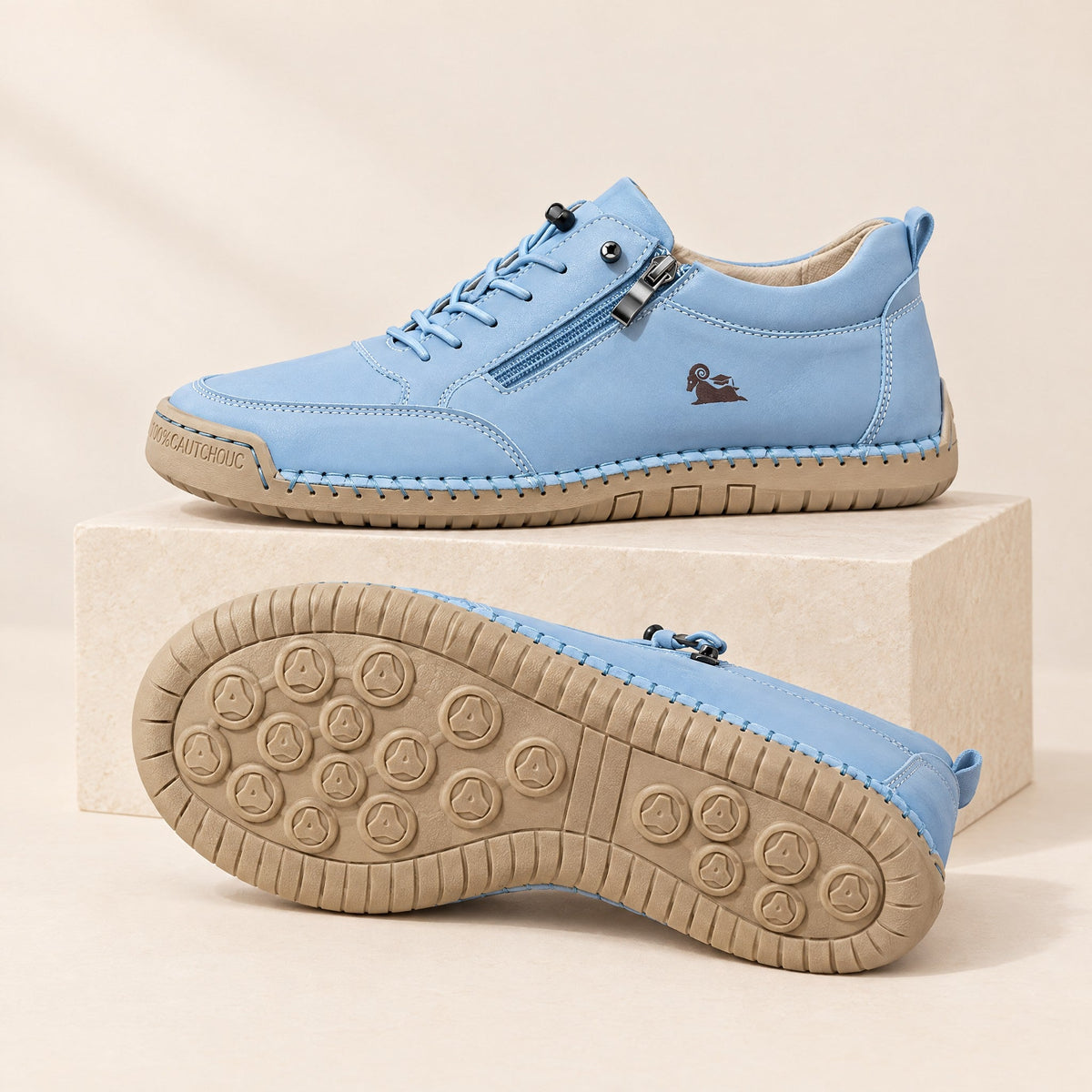 ELLA Sneaker in Blau – Seitenansicht mit Reißverschluss und Sohle